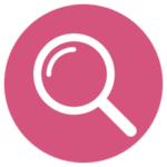 Magnifying glass icon representing SEO strategy.